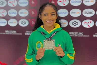 notícia: Com apoio do Governo do Estado, atleta do Amapá conquista medalha de prata de wrestling em evento internacional no Peru