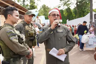 notícia: Governo do Amapá realiza a 8ª edição do Natal Solidário do GTA na comunidade ribeirinha do Matapi Mirim, em Santana